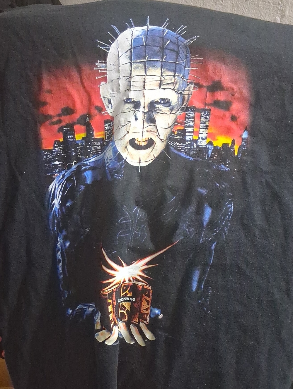 Supreme Hellraiser Black Tee with Horror Pinhead Graphic and Fiery Skyline